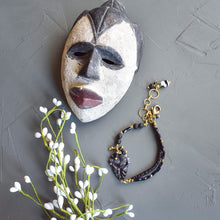 Load image into Gallery viewer, Black and White African Mask Wishbone Bracelet