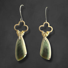 Load image into Gallery viewer, Pair of gold and green teardrop earrings on a dark background