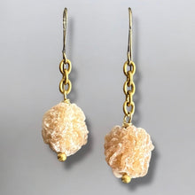 Load image into Gallery viewer, Pair of earrings with gold hooks and beige stone beads on a gray background