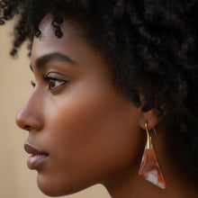 Load image into Gallery viewer, Pair of earrings with brown and white marbled design on a blurred background
