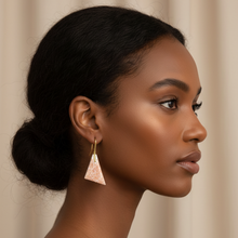 Load image into Gallery viewer, pink and cream gemstone earrings on a Black model with a beige background 