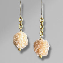 Load image into Gallery viewer, Pair of earrings with rough stone-like beads on a gray background
