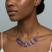 Load image into Gallery viewer, trapezoid shaped amethyst necklace on a mode's neckline.