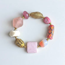 Load image into Gallery viewer, Colorful  pink beaded bracelet on a light background