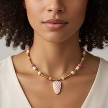 Load image into Gallery viewer, Necklace with a large zebra rock pendant worn by a model