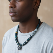Load image into Gallery viewer, Person wearing a beaded necklace with a neutral background