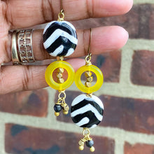 Load image into Gallery viewer, Black and White Kazuri and Brass Dangle Earrings